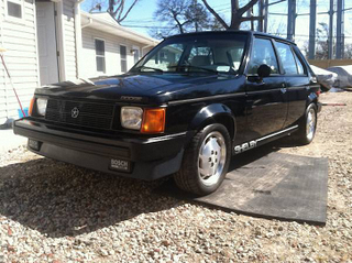 Illustration for article titled For $11,500, This 1986 Shelby Dodge Could Let You Go Like Hell S'more